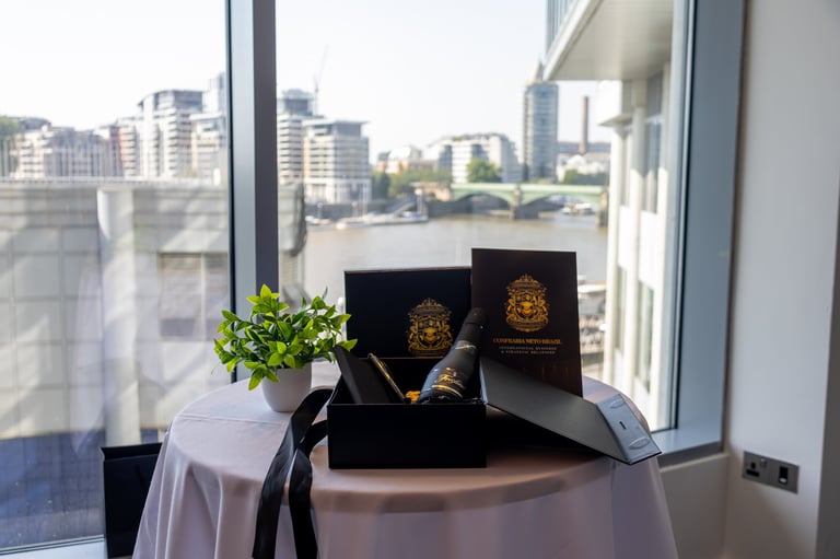 Luxury jewelry display on draped table with city skyline view through floor-to-ceiling windows
